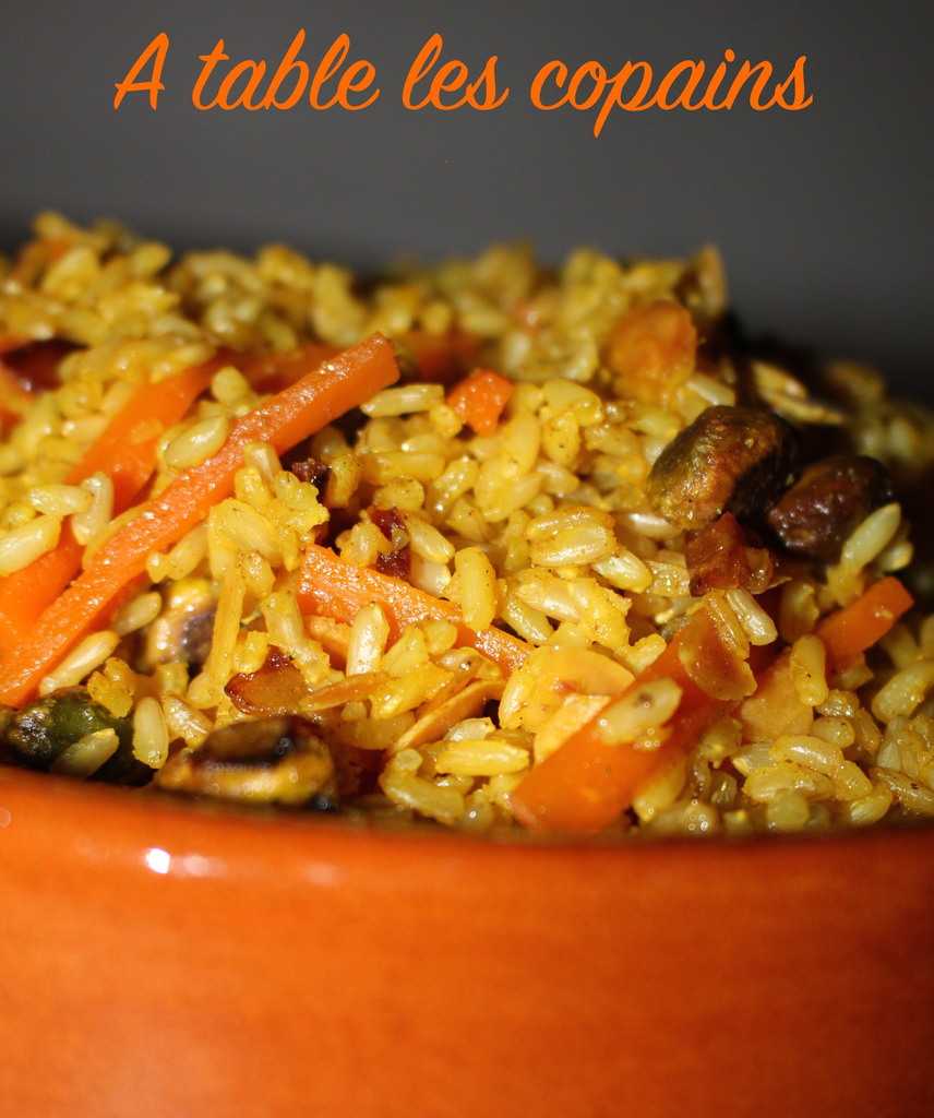 Riz aux épices, carottes à l'orange, pistaches, amandes et fruits secs